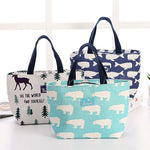 navy blue and blue fashionable women lunch totes on desk